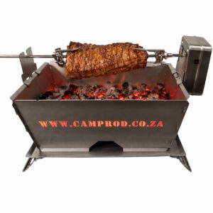 Flat Pack Deluxe Long Braai rotisserie cooking pork belly over wood fire coals